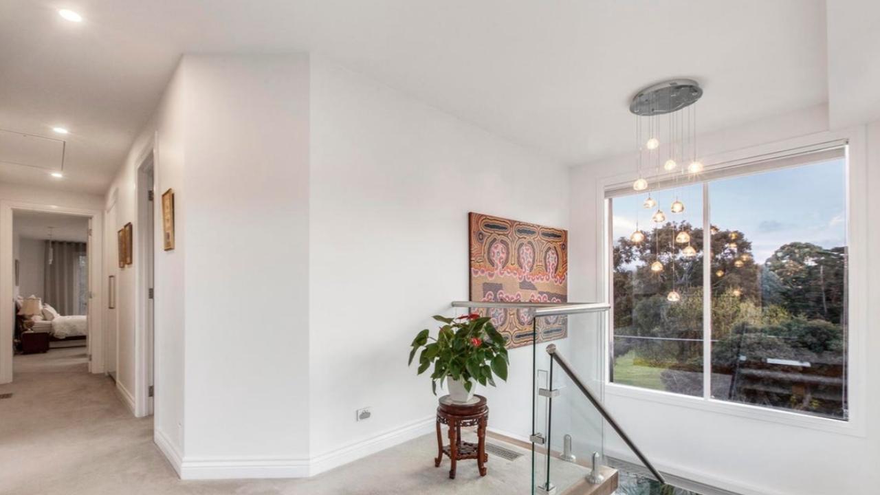 A French travertine entry and striking architecture give 303 The Boulevard standout street presence in blue-chip Ivanhoe East.