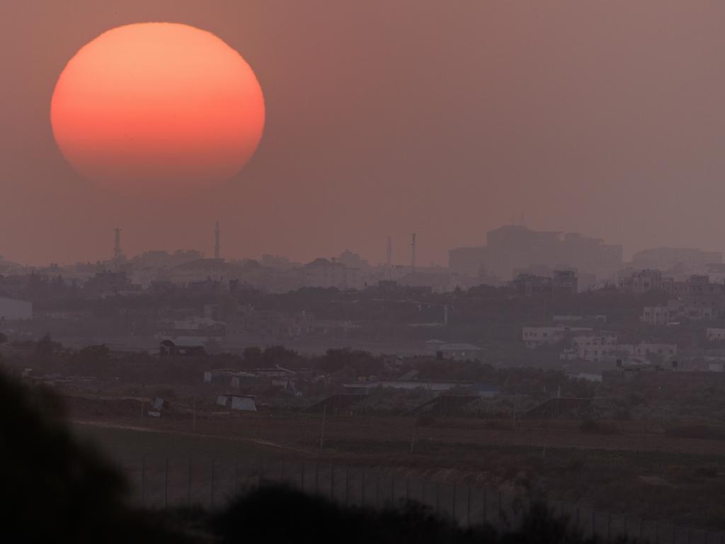 The sun sets over the Gaza Strip on October 30. Picture: Dan Kitwood/Getty Images