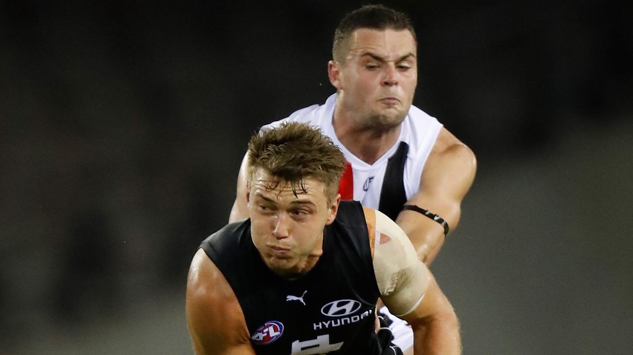 MELBOURNE, AUSTRALIA - MARCH 04: Patrick Cripps of the Blues and Brad Crouch of the Saints compete for the ball during the 2021 AAMI Community Series match between the Carlton Blues and the St Kilda Saints at Marvel Stadium on March 4, 2021 in Melbourne, Australia. (Photo by Michael Willson/AFL Photos via Getty Images)