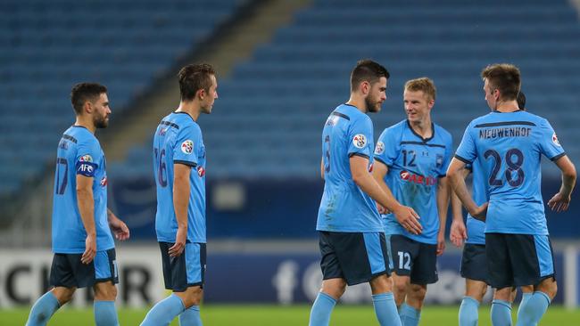 Sydney FC players celebrate their win over Shanghai SIPG. Picture: AFP