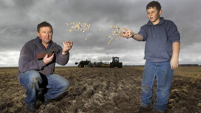 Ash Nelson & his son Todd, 9, at his farm, Cressy