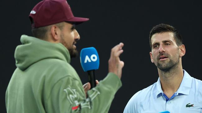 MELBOURNE, AUSTRALIA - JANUARY 23: Novak Djokovic of Serbia is interviewed by Nick Kyrgios after their quarterfinals singles match against Taylor Fritz of the United States during the 2024 Australian Open at Melbourne Park on January 23, 2024 in Melbourne, Australia. (Photo by Daniel Pockett/Getty Images)