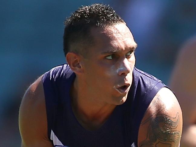 PERTH, AUSTRALIA - MARCH 12: Harley Bennell of the Dockers gathers the ball during the NAB Challenge match between the Fremantle Dockers and the Geelong Cats at Domain Stadium on March 12, 2016 in Perth, Australia.  (Photo by Paul Kane/Getty Images)