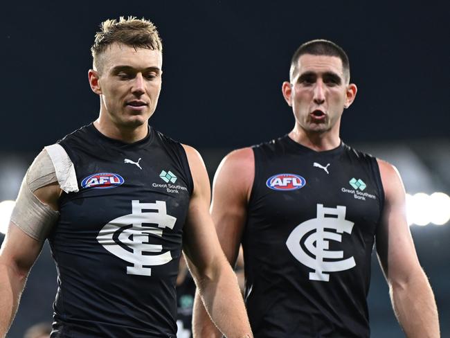 Losing Patrick Cripps (left) or Jacob Weitering for any period due to injury would immediately jeopardise the Blues’ finals hopes this season. Picture: Quinn Rooney / Getty Images