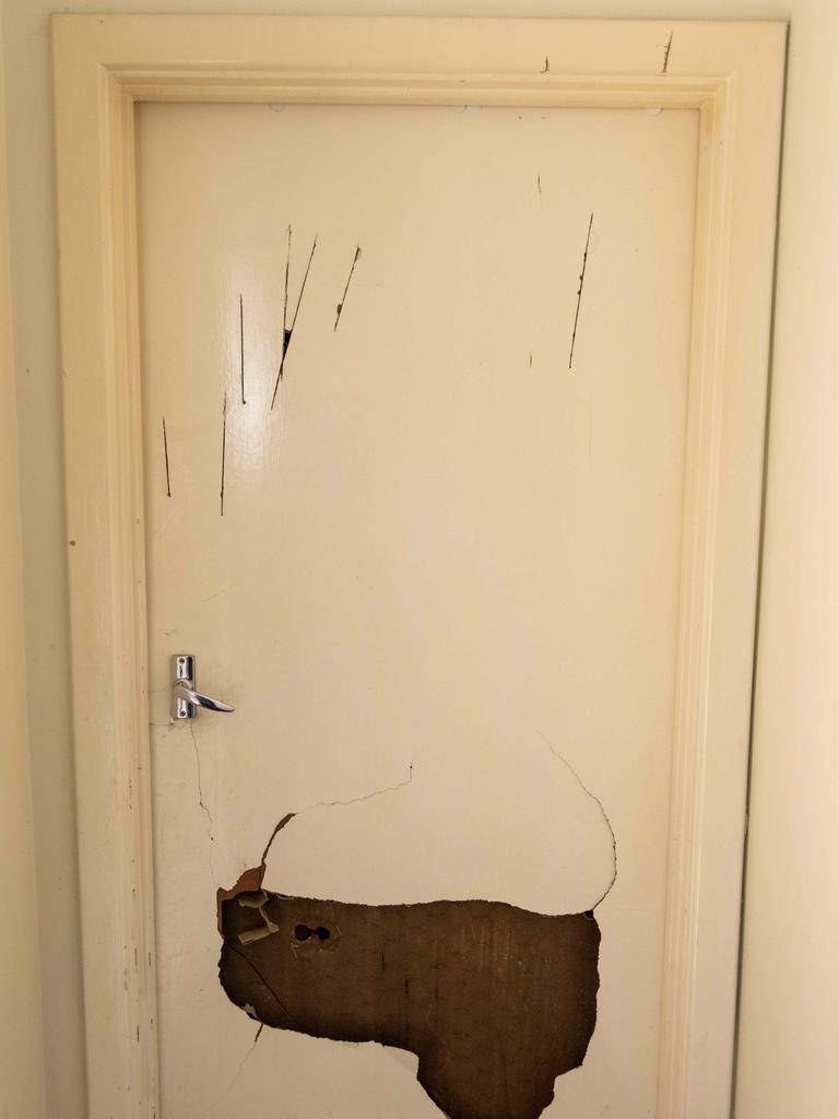 Machetes were pierced through internal doors during the attack. Picture: Kelly Barnes