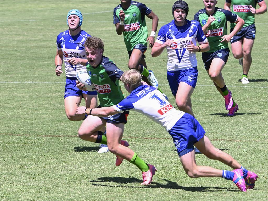 Campbell Lloyd tries to get past Jackson Winnett. Picture: Martin Ollman