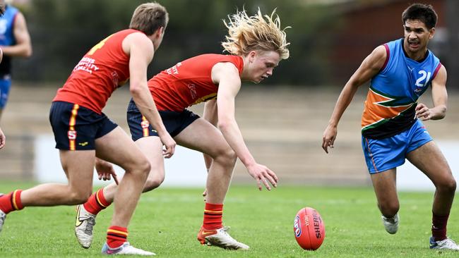 Bodie Ryan wins the ball in the national carnival opener. Picture: Mark Brake/AFL Photos