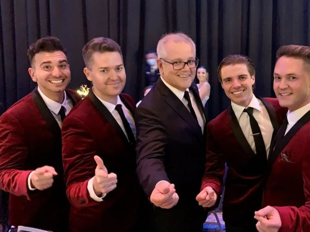 Prime Minister Scott Morrison attended Kincoppal-Rose Bay's Graduation Gala where a positive Covid case was. He is pictured with members of Boys in the Band who played the event. Picture: Instagram