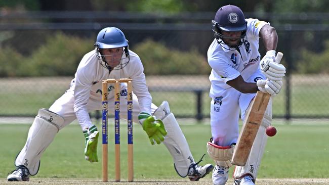 Williamstown’s Brenton Hodges and Hoppers Crossing’s Shijit Chandran in the contest on Saturday. Picture: Andy Brownbill