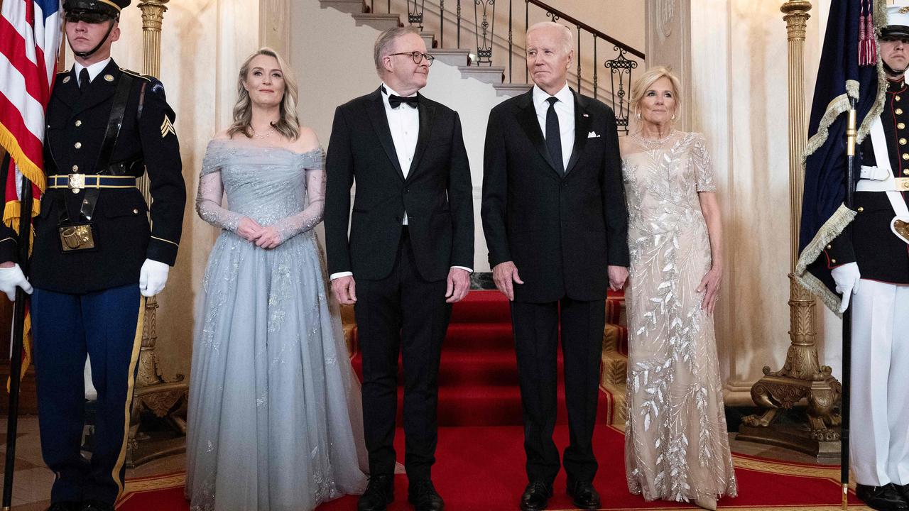 Jodie Haydon and Prime Minister Anthony Albanese with US President Joe Biden and First Lady Jill Biden before the Grand Staircase ahead of a state dinner at the White House in Washington, DC. Picture: Brendan Smialowski / AFP