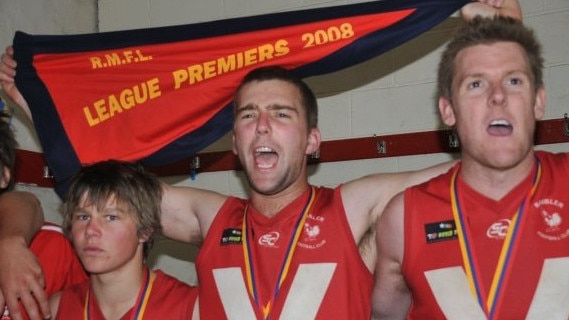 Ryan Morris (middle) celebrates a premiership for Ramblers. Picture: Supplied