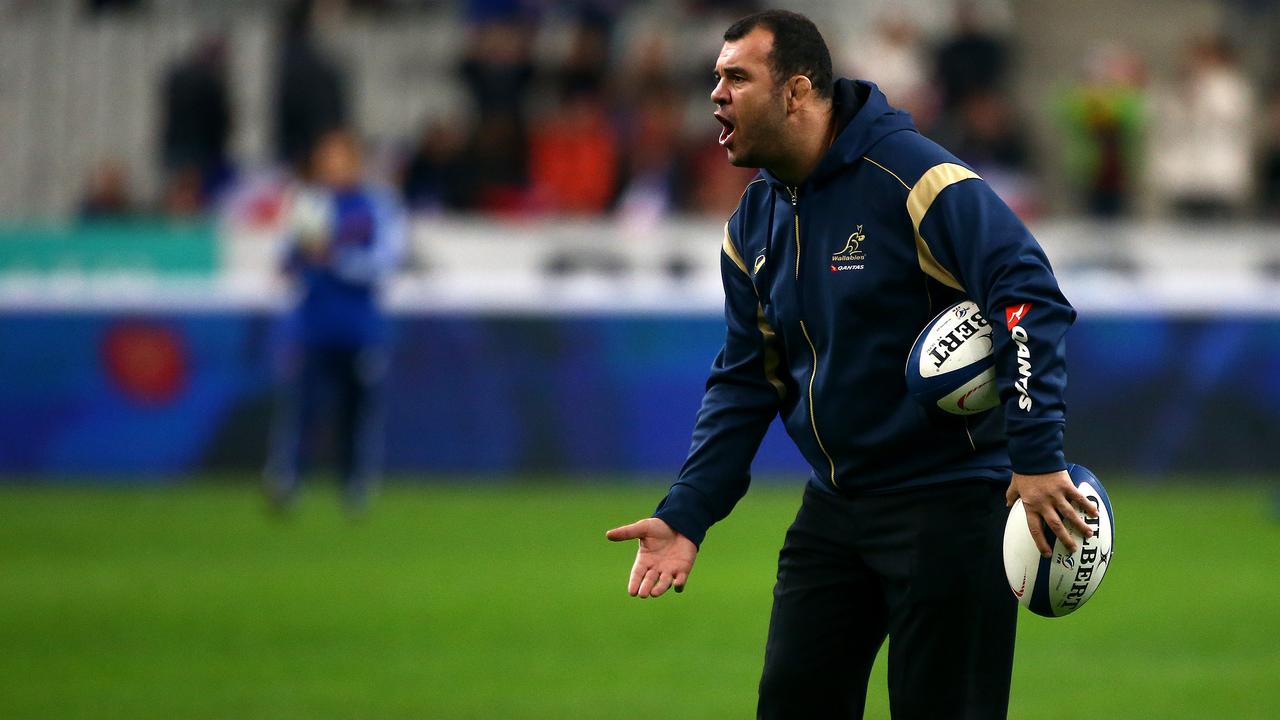 PARIS, FRANCE - NOVEMBER 15: Australia head coach Michael Cheika keeps an eye on the warm up during the International match between France and Australia at The Stade De France on November 15, 2014 in Paris, France. (Photo by Charlie Crowhurst/Getty Images)