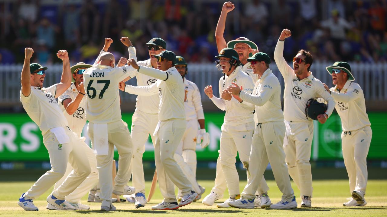 Nathan Lyon and all of the team celebrate his 500th Test Wicket during day four of the Men's First Test match between Australia and Pakistan. Picture: James Worsfold/Cricket Australia via Getty Images