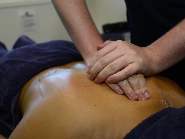 Day in the life of a masseuse.Remedial therapist Gerard Kelly from Gladstone Physio & Fitness, Glenlyon Street, Gladstone.Photo Christopher Chan / The Observer