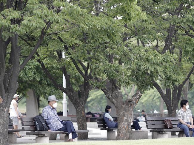 Visitors wearing face masks at a park in Seoul. Picture; AP.