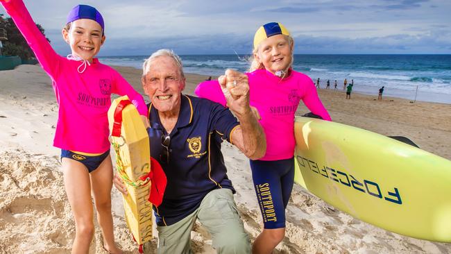 Southport Surf Club life member John Ogilvie with nippers Imogen Coman, 10 and Dean Olsen, 11 ahead of the club's 100-year anniversary celebrations this weekend.Picture: Nigel Hallett