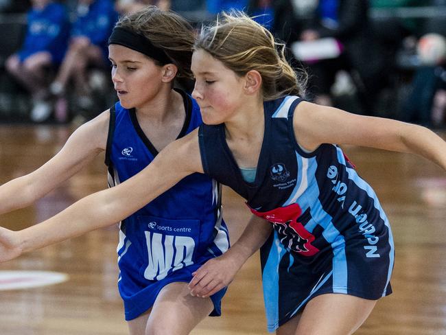 Action between Northern York Penisula and  North Eastern during the Sapsasa Country Netball Carnival day one at Netball SA Stadium Mile End.Monday June 27,2022.Picture Mark Brake