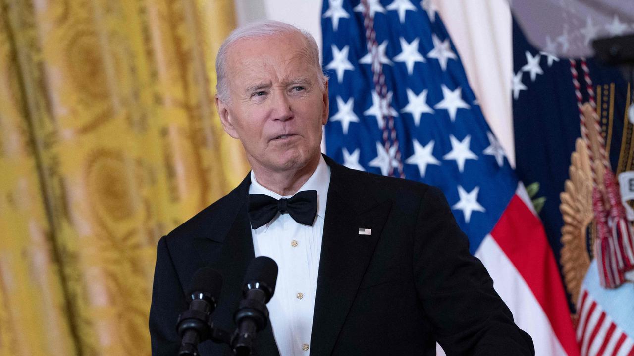 United States President Joe Biden hosts Kennedy Center Honorees in the East Room of the White House in Washington, DC, December 8, 2024. (Photo by Chris Kleponis / AFP)