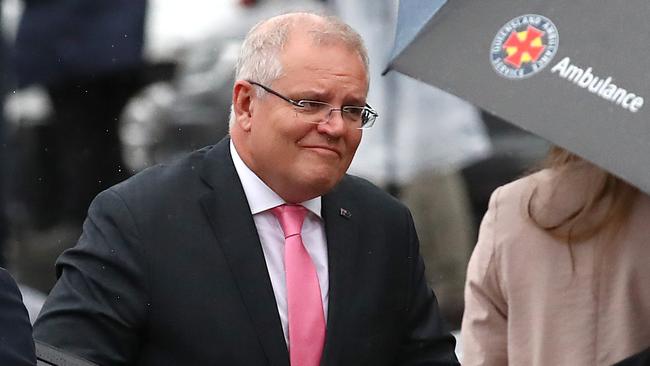 Prime Minister Scott Morrison is expected to consider handing out cash to families hit by a coronavirus-induced recession. Picture: AAP