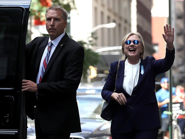 Democratic presidental nominee former Secretary of State Hillary Clinton waves as she leaves the home of her daughter Chelsea Clinton on September 11. Picture: Getty