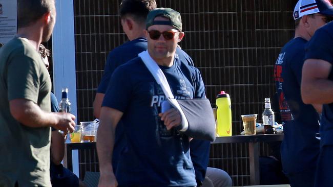 Cooper Cronk sported a sling during the Roosters premiership celebrations this week. Picture: Toby Zerna