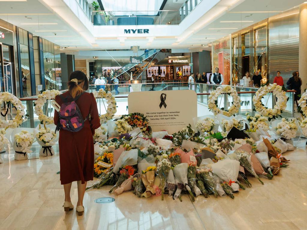 Floral tributes were laid inside and outside the Bondi Junction shopping centre. Picture: NCA NewsWire / David Swift