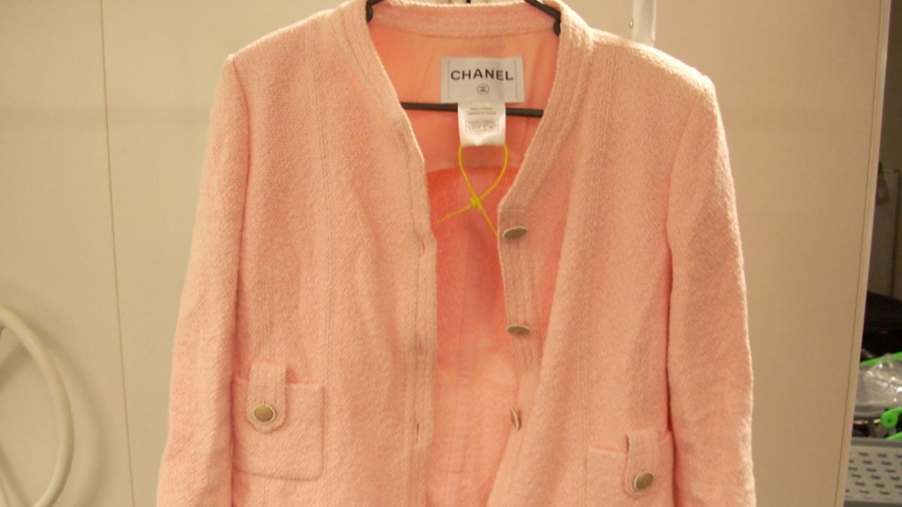 A classic pink Chanel designer jacket.