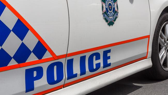 A police officer had his foot run over by youths driving a stolen Holden Colorado.