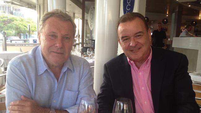 Bevan Lynch (left) and Bruce Grady enjoy a working lunch.