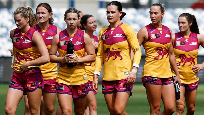 GEELONG, AUSTRALIA - OCTOBER 20: Lions players look dejected after a loss during the 2024 AFLW Round 08 match between the Geelong Cats and the Brisbane Lions at GMHBA Stadium on October 20, 2024 in Geelong, Australia. (Photo by Michael Willson/AFL Photos via Getty Images)