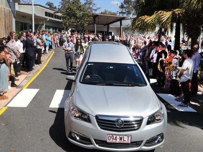 A guard of honour for Dylan McPadden as the hearse leaves church grounds. Picture: Glenn Hampson.