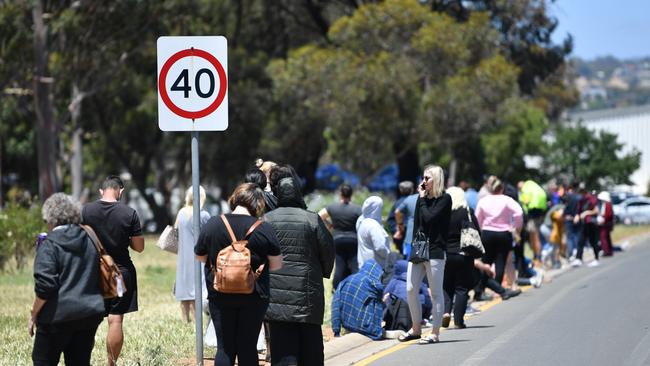 South Australians queue at a COVID testing facility at Parafield Gardens in Adelaide on Monday. Picture: NCA NewsWire / David Mariuz