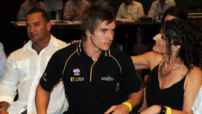 Dustin Martin just after his name was called out at the 2009 AFL Draft, with dad Shane and his mum, Kathy Knight. Picture: Michael Dodge