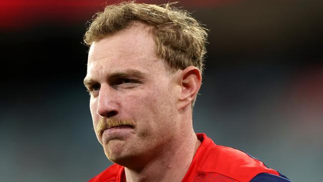 MELBOURNE, AUSTRALIA - JULY 13: Harrison Petty of the Demons warms up during the round 18 AFL match between Melbourne Demons and Essendon Bombers at Melbourne Cricket Ground, on July 13, 2024, in Melbourne, Australia. (Photo by Kelly Defina/Getty Images)