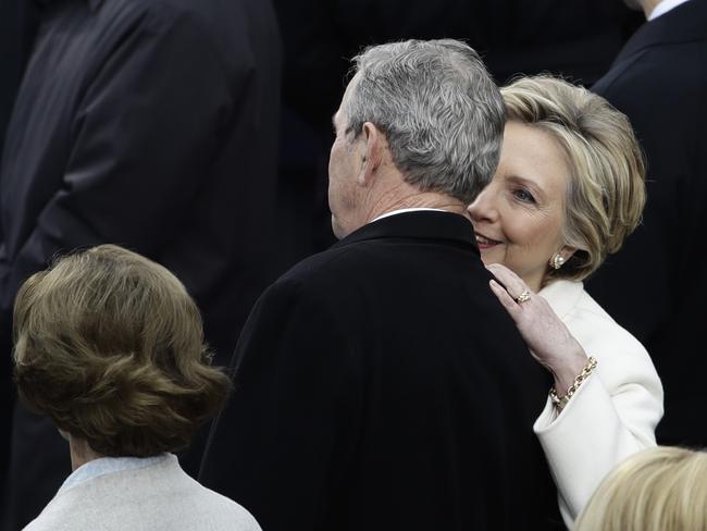 Former Secretary of State Hillary Clinton speaks to Former President George W. Bush and his wife Laura before the 58th Presidential Inauguration for President-elect Donald Trump at the U.S. Capitol in Washington on January 20, 2017. Picture: AP