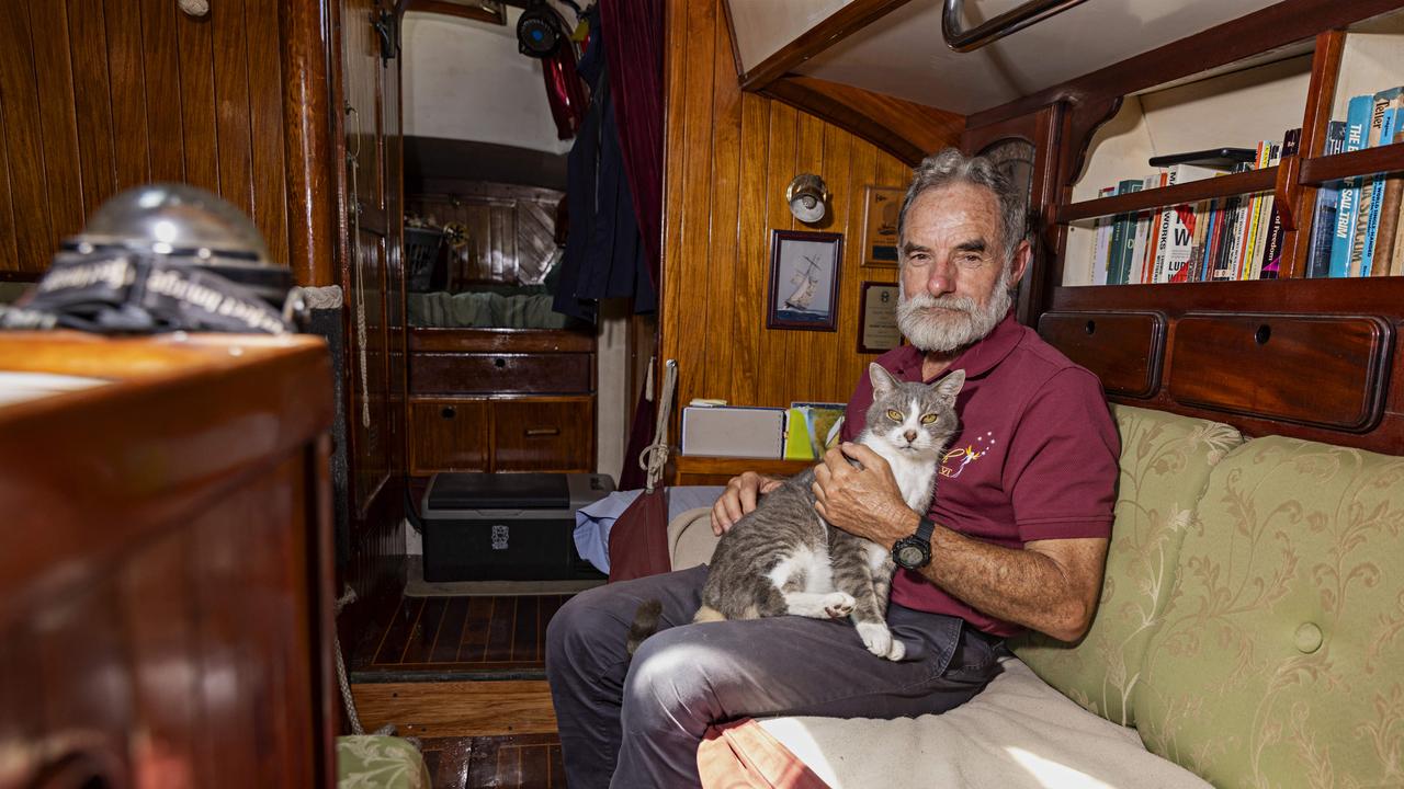 SYDNEY, AUSTRALIA, NOVEMBER 22, 2023. Sylph VI skipper and owner Robert â&#128;&#152;Bobâ&#128;&#153; Williams with his cat Oli who will sail with Bob in the Sydney to Hobart yacht race on board Sylph VI. Photographer: Adam Yip