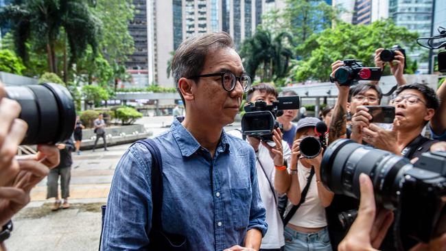 Chung Pui-kuen, the former chief editor of Hong Kong's now shuttered pro-democracy news outlet Stand News, arrives at the District Court in Hong Kong for sentencing. Picture: AFP