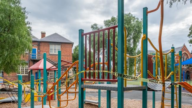 A primary school playgrounds that has been taped off due to social distancing rules. Picture: Asanka Ratnayake/Getty Images