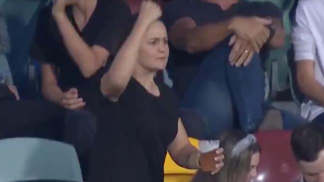 Ash Barty was captured at the footy earlier this month, complete with beer in hand. Picture: Channel 7