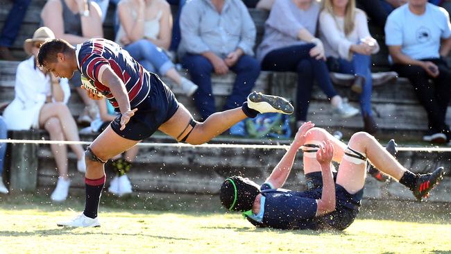 Ngiyaani Waters goes in to score a try for The Southport School against Brisbane Grammar School. Picture: Richard Gosling