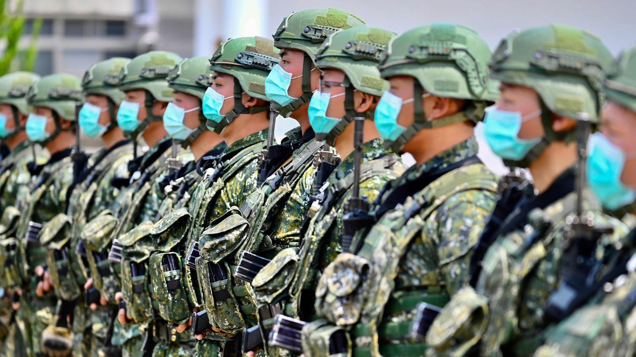 Soldiers listen to an address by Taiwanese President Tsai Ing-wen during her visit to a military base in Tainan in April 2020. Picture: Sam Yeh/AFP