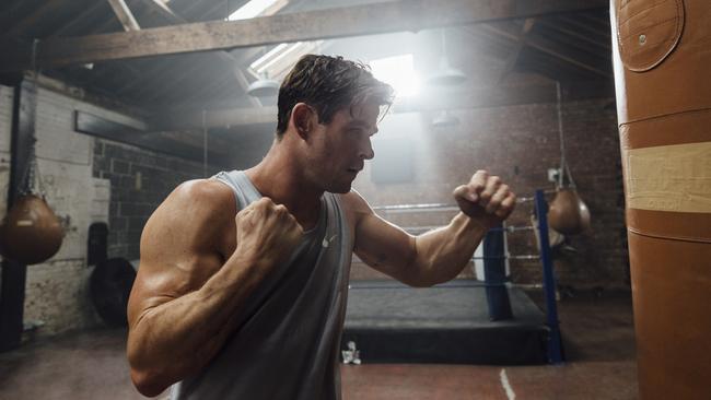 Chris Hemsworth working out on the heavy bag. Picture: Greg Funnell