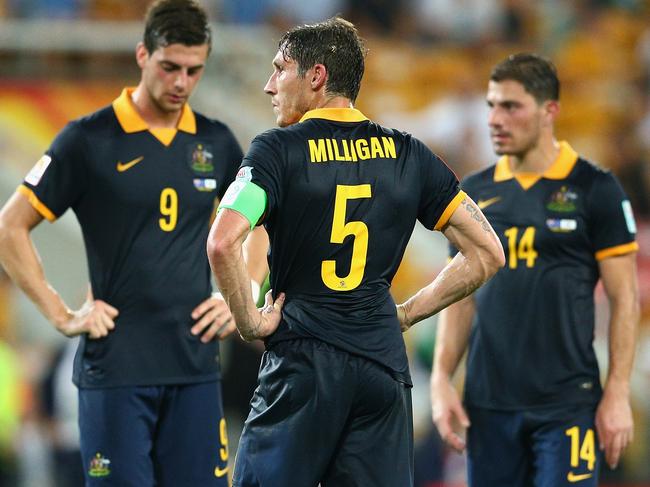 BRISBANE, AUSTRALIA - JANUARY 17: Mark Milligan of the Socceroos prepares for a penalty with team mates during the 2015 Asian Cup match between Australia and Korea Republic at Suncorp Stadium on January 17, 2015 in Brisbane, Australia. (Photo by Cameron Spencer/Getty Images)