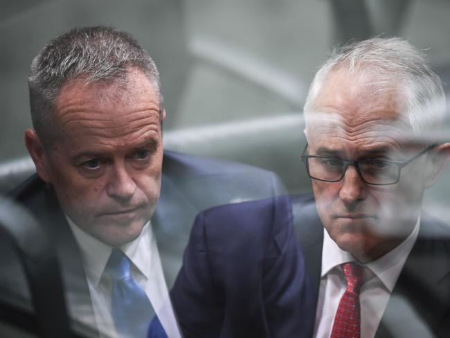 A double exposure of Australian Opposition Leader Bill Shorten (left) and Australian Prime Minister Malcolm Turnbull during House of Representatives Question Time at Parliament House in Canberra, Wednesday, May 9, 2018. (AAP Image/Lukas Coch) NO ARCHIVING