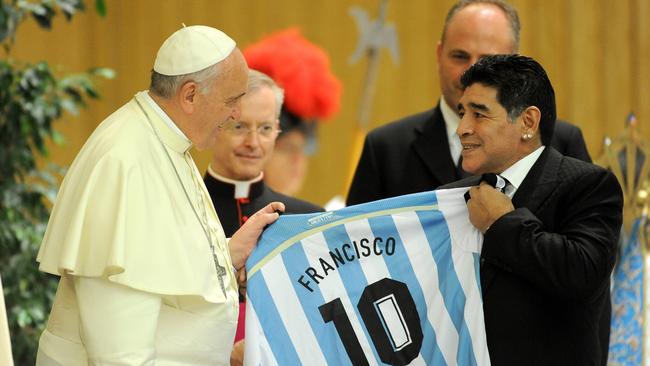 Pope Francis meets Diego Maradona during an audience in 2014 in Rome.