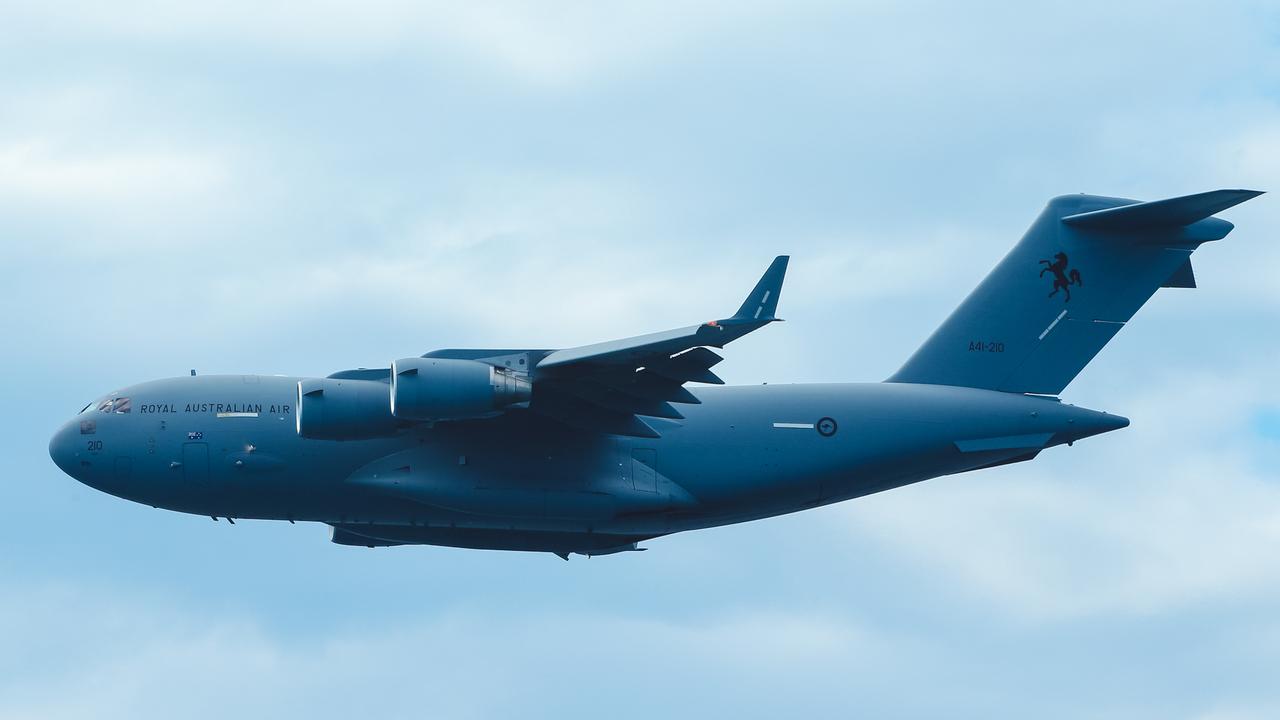 A RAAF C130 flying past the inaugural Pacific Air Show over Surfers Paradise. Picture: Glenn Campbell