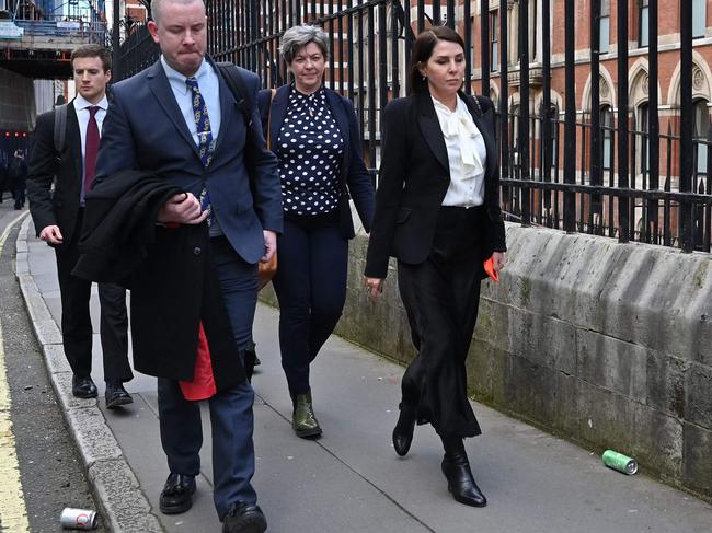 English actor and fashion designer Sadie Frost (R) leaves from the Royal Courts of Justice, Britain's High Court, in central London. Picture: AFP