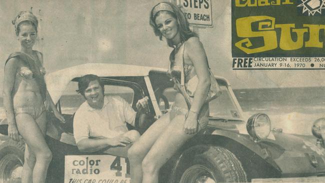 Gold Coast Meter Maids Ann Stengel and Kathy Ford with radio identity Billy J Smith during a promotional photo to giveaway a car in 1970 through the Gold Coast Sun. Picture: Gold Coast Meter Maids
