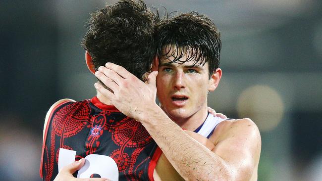 Brothers Andrew and Angus Brayshaw embrace after the match. Picture: Getty Images