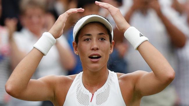 Spain's Garbine Muguruza reacts after winning the Wimbledon final against Venus Williams.